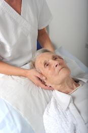 Older lady having osteopathic treatment (copyright image General Osteopathic Council)